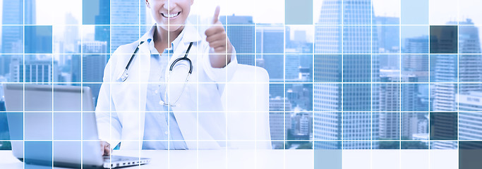 Image showing african female doctor with laptop shows thumbs up