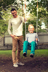 Image showing happy family in front of house outdoors