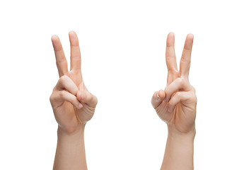 Image showing man hands showing v-sign