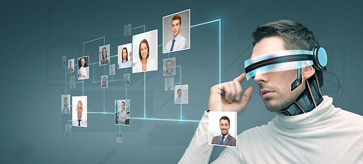 Image showing man with futuristic 3d glasses and sensors