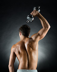 Image showing young man with dumbbell