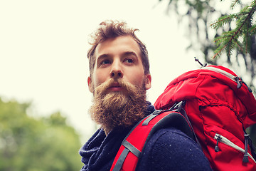 Image showing man with beard and backpack hiking