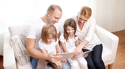 Image showing happy family with tablet pc computers at home