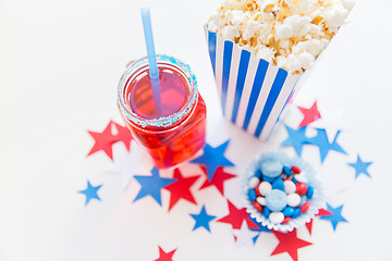 Image showing drink and popcorn with candies on independence day