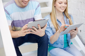 Image showing close up of students with tablet pc at school