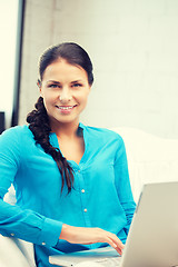 Image showing happy woman with laptop computer