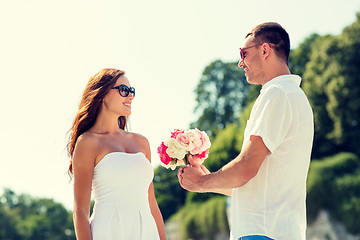 Image showing smiling couple in city