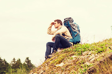 Image showing man with backpack hiking