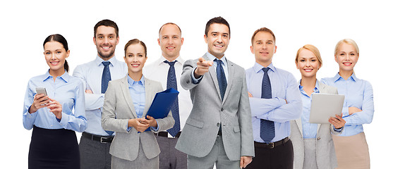 Image showing group of happy business people pointing at you