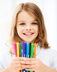 Image showing girl showing colorful felt-tip pens