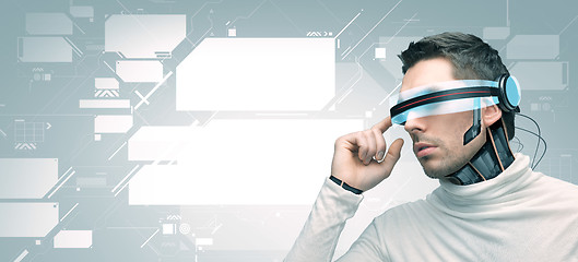 Image showing man with futuristic 3d glasses and sensors