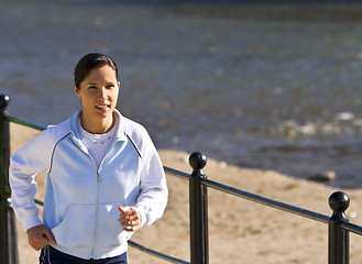 Image showing Jogging on the riverside