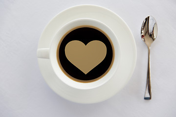 Image showing cup of black coffee with heart shape and spoon