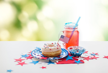 Image showing donut with juice and candies on independence day
