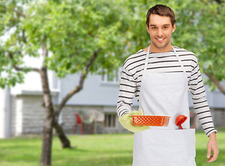 Image showing happy man or cook with baking and kitchenware