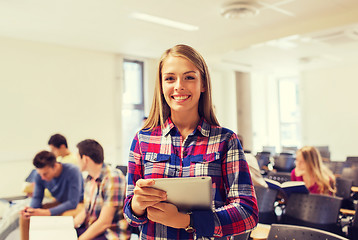 Image showing group of smiling students with tablet pc