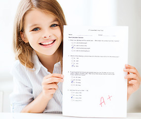 Image showing girl with test and grade at school