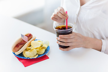 Image showing close up of woman drinking coca cola