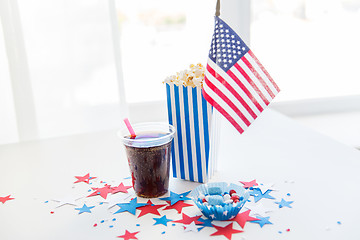 Image showing cola and popcorn with candies on independence day