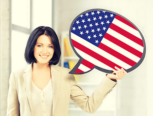 Image showing smiling woman with text bubble of american flag