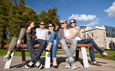 Image showing group of students or teenagers drinking coffee