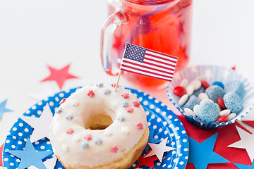 Image showing donut with juice and candies on independence day