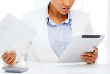 Image showing businesswoman with tablet pc in office