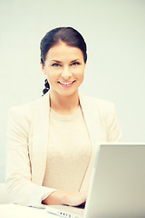 Image showing happy woman with laptop computer