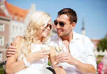 Image showing couple drinking wine in cafe