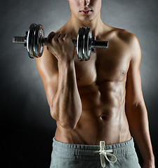 Image showing young man with dumbbell