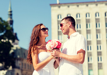 Image showing smiling couple in city