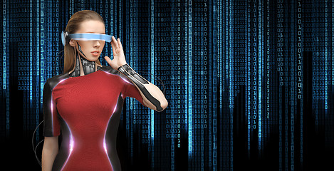 Image showing woman with futuristic glasses and sensors