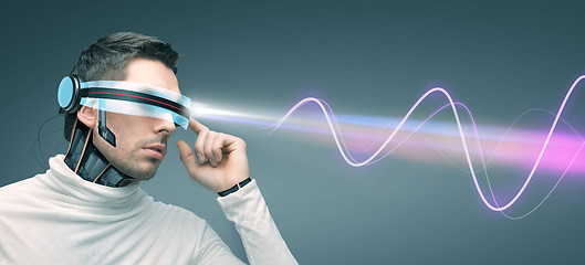 Image showing man with futuristic 3d glasses and sensors