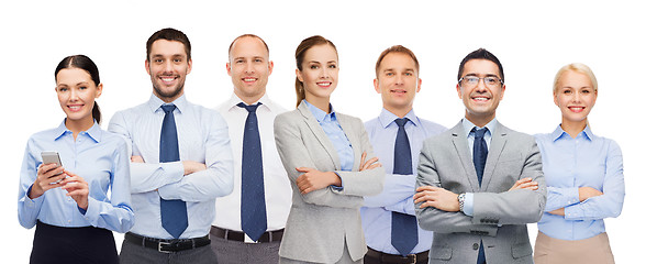 Image showing group of happy businesspeople with crossed arms