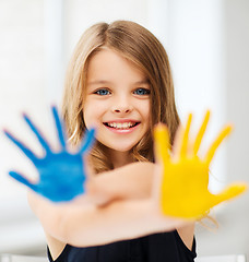 Image showing girl showing painted hands