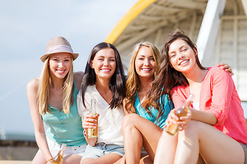 Image showing girls with drinks on the beach