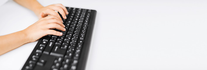 Image showing student girls hands typing on keyboard