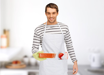 Image showing happy man or cook with baking and kitchenware