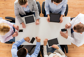 Image showing business team with smartphones and tablet pc