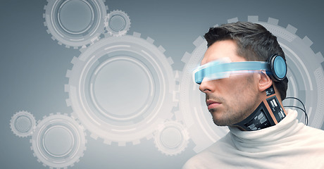 Image showing man with futuristic glasses and sensors