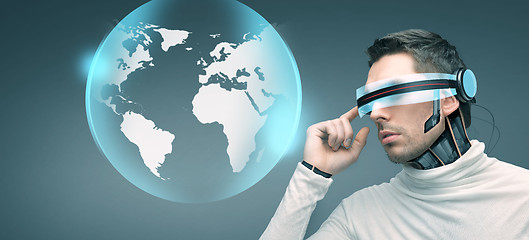 Image showing man with futuristic 3d glasses and sensors