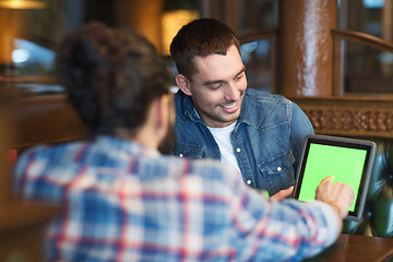 Image showing male friends with tablet pc at bar