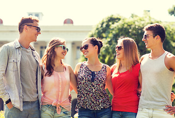 Image showing group of smiling friends outdoors