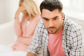 Image showing unhappy couple having argument at home