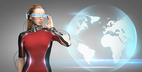 Image showing woman with futuristic glasses and sensors