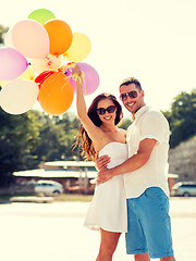 Image showing smiling couple in city