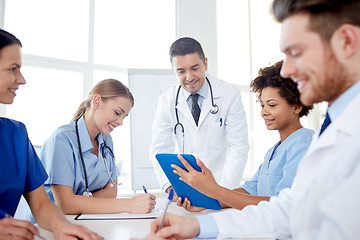 Image showing group of happy doctors meeting at hospital office