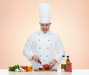 Image showing happy male chef cook cooking food