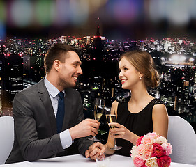 Image showing couple with glasses of champagne at restaurant