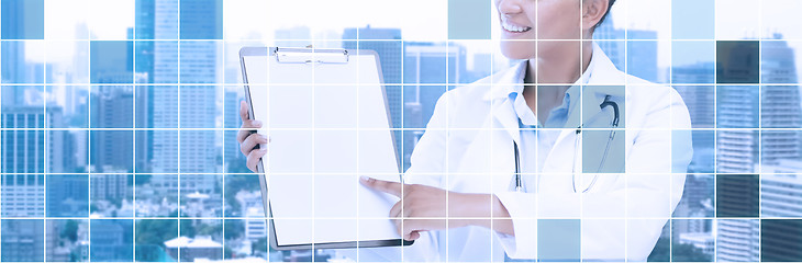 Image showing happy african female doctor with clipboard